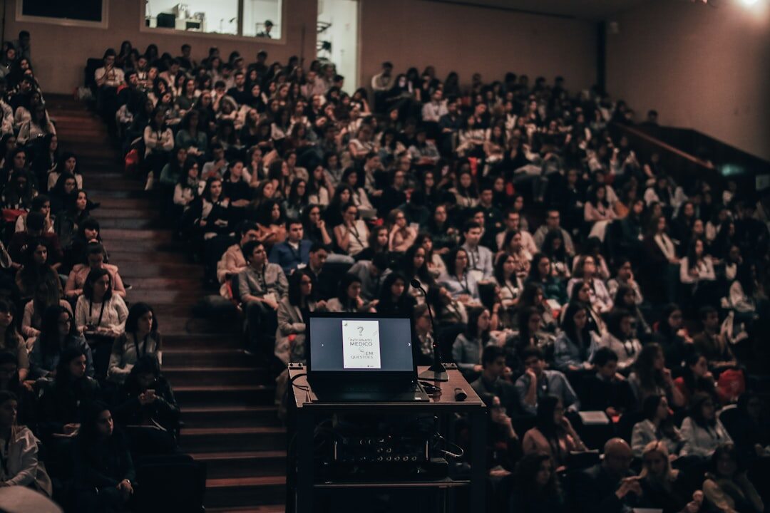 Business summit conference with large audience
