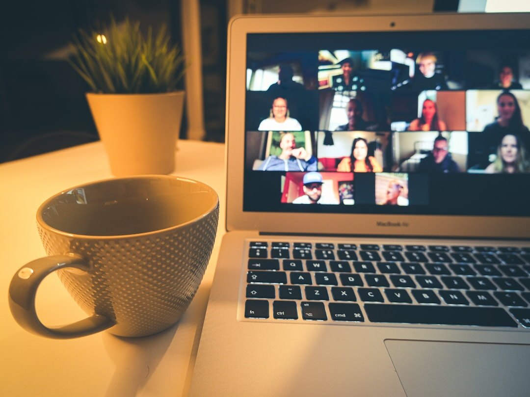 Online video conference call on laptop screen